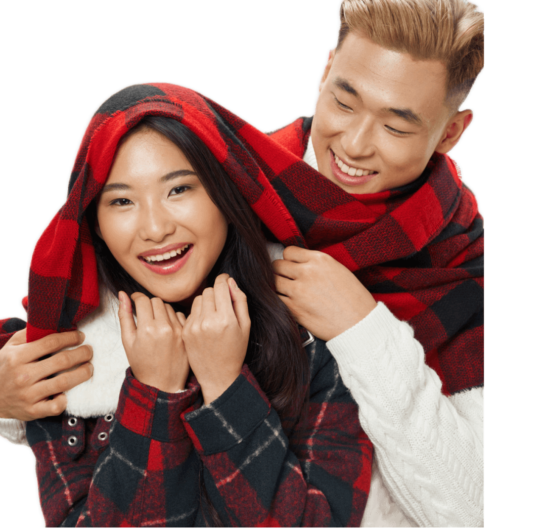 Happy couple in plaid scarf